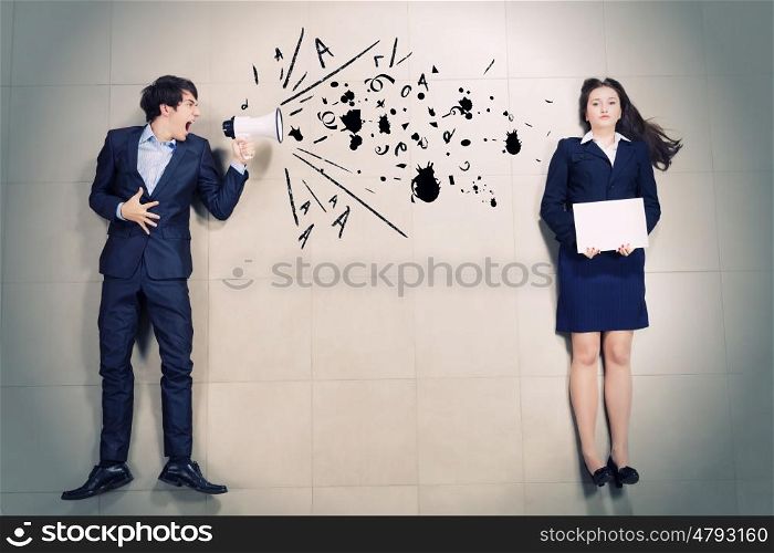 Aggressive management. Aggressive businessman shouting at colleague with megaphone