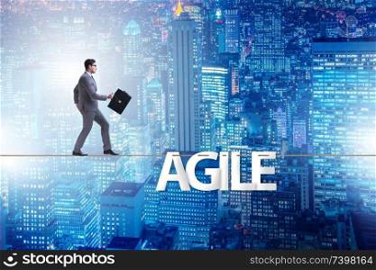 Agile transformation concept with businessman walking on tight rope. Agile transformation concept with businessman walking on tight r