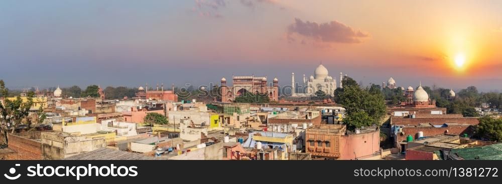 Agra city and Taj Mahal sunset panorama, India.