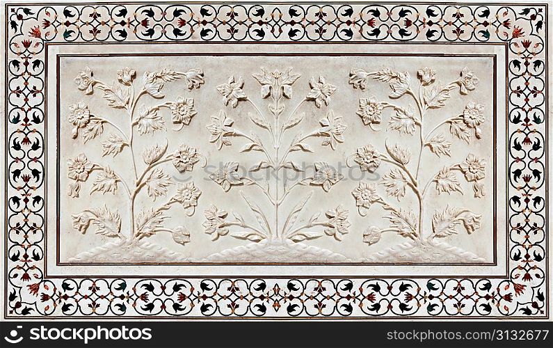 AGRA, INDIA - APRIL 10: Pattern on Taj Mahal on April 10, 2012 in Agra, India. Taj Mahal is widely recognized as the jewel of Muslim art and one of the universally masterpieces of the world