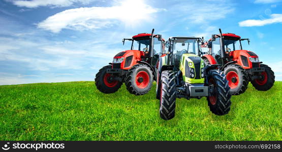 Agricultural advertisement banner - group of new and modern generic tractors on a green meadow in sunny day (mixed).