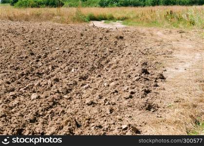 agricultural arable land, ploughed field. ploughed field, agricultural arable land
