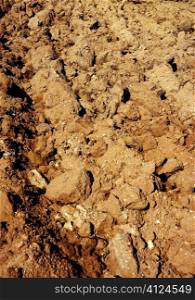 Agriculture field red clay soil texture macro