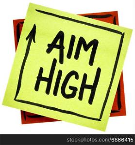 Aim high motivational reminder or advice - handwriting in black ink on an isolated sticky note
