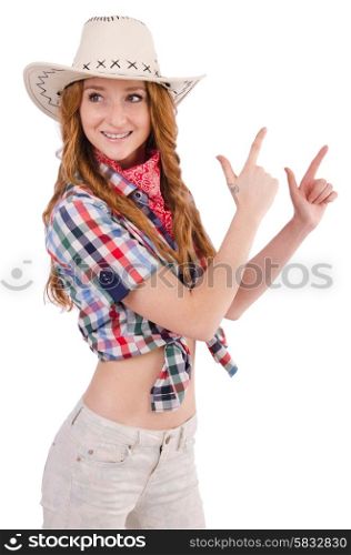 Aiming redhead cowgirl isolated on white