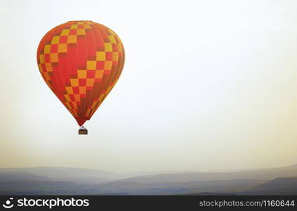 Air balloon flying in the sky. Horizontal photo