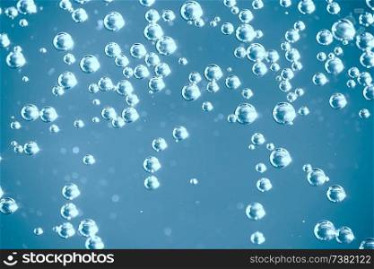 air bubbles in water macro background / blue background abstract bubbles in water
