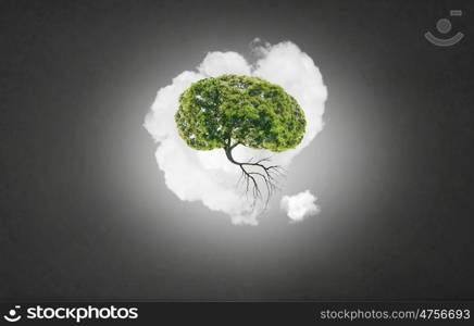 Air pollution. Conceptual image of green tree shaped like brain