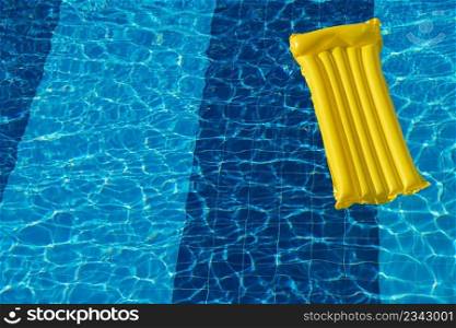Air Yellow Mattress On The Water In The Pool