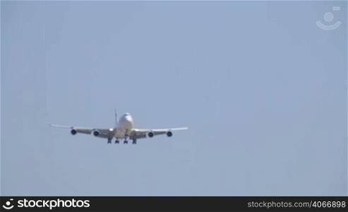 Aircraft Boeing 747-400 flying. Flying airplane approaching airstrip. The Boeing 747 is a wide-body commercial airliner and cargo transport, often referred to as Jumbo Jet or Queen of the Skies.