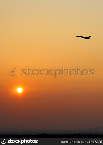 Aircraft takeoff at sunset