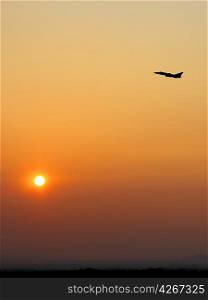 Aircraft takeoff at sunset