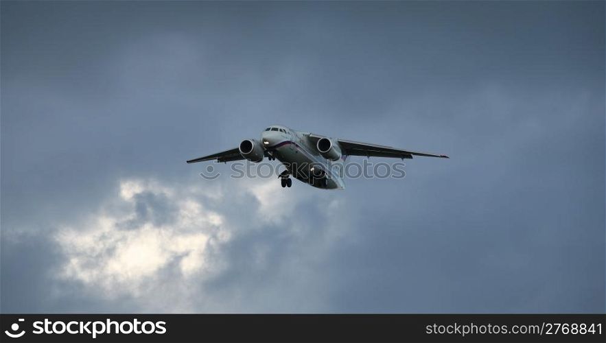 airplane An 148 comes in to land. airplane Antonov 148