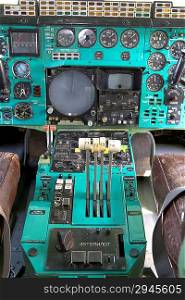 Airplane Cockpit thrust levers with hand on top for takeoff, Tu-144.