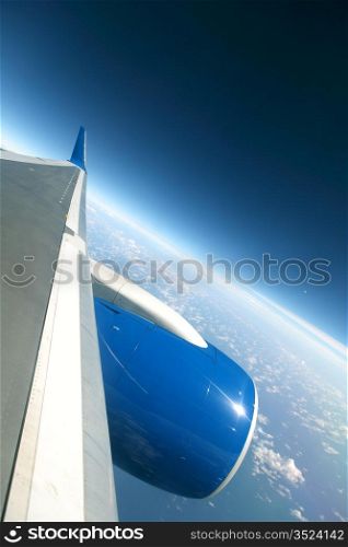 airplane fly in blue sky cloud around