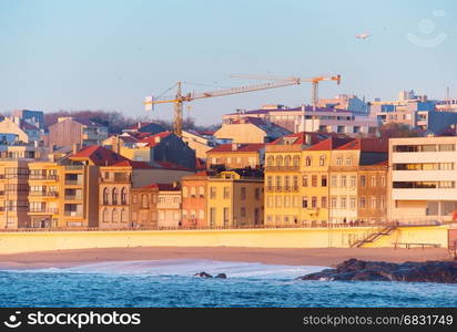 Airplane flying above the Matosinhos - Porto luxury district. Portugal