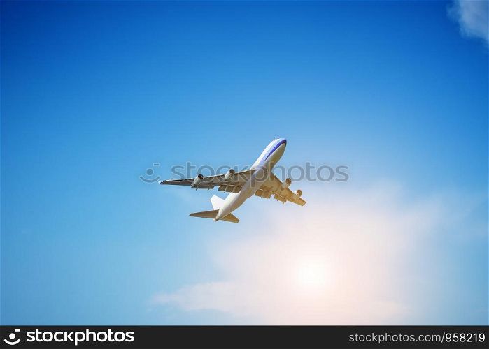 Airplane flying on blue sky background