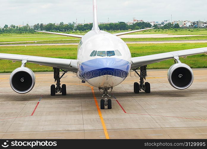 Airplane is taxing in airport getting ready to fly