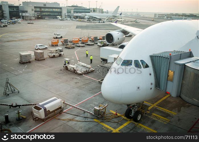Airplane parking at gate in Frankfurt airport, Germany
