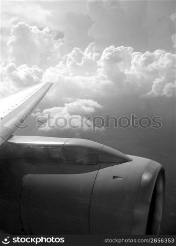 airplane reactor sky view from aircraft black and white