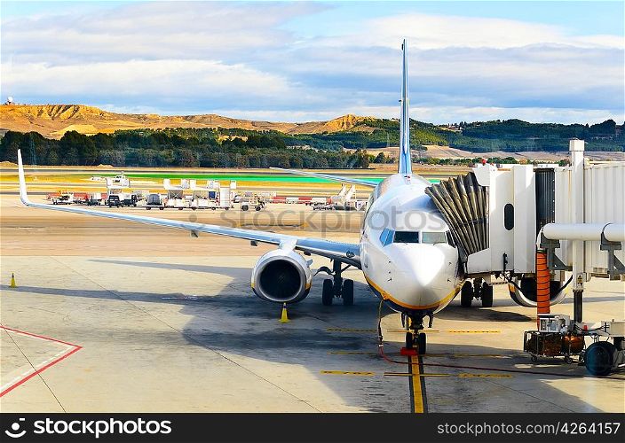 airplane standing on field at Barajas, Madrid, Spain