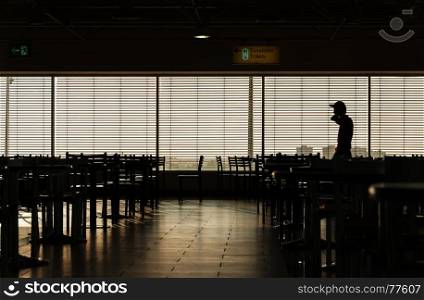 Airport cafe man silhouette