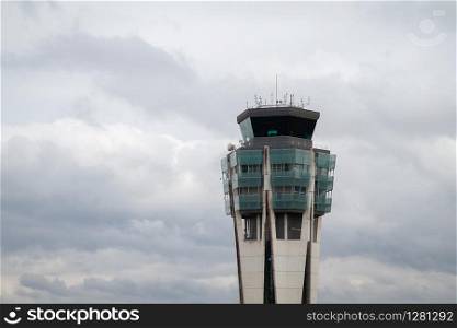Airport control tower over cloudy sky. Santiago de Compostela airport, Spain