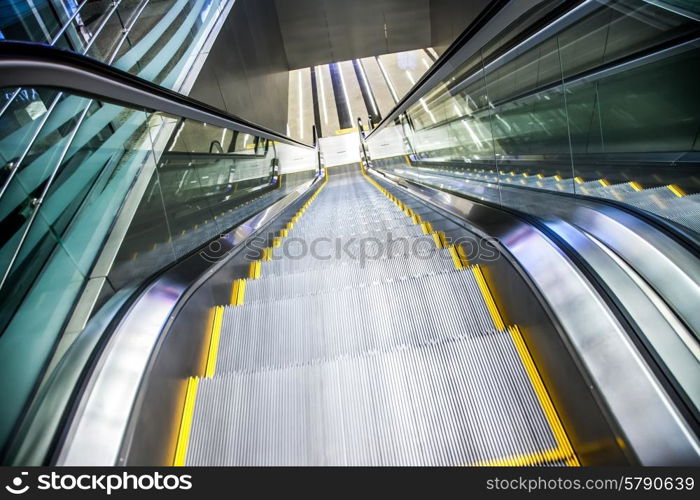 Airport moving sidewalk also travelator, walkalator and movator.