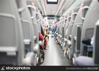 Aisle with seats in modern train