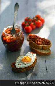 Ajvar -Eggplants or cooked beans, roasted red peppers on bread