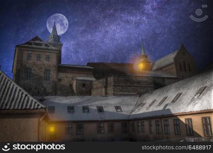 Akershus Fortress in Oslo. At night, under the light of the stars and the moon.. Akershus Fortress in Oslo.