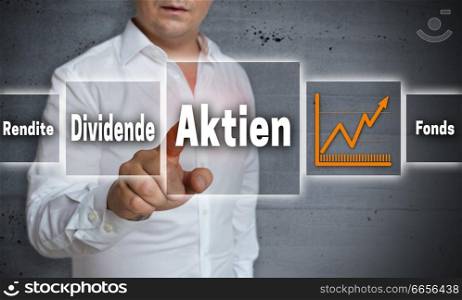 Aktien (in germn Shares, Dividend, Yield, Fund) concept background is shown by man.. Aktien (in germn Shares, Dividend, Yield, Fund) concept background is shown by man