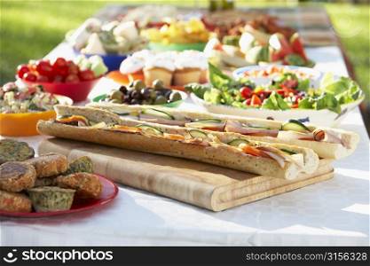 Al Fresco Dining, With Food Laid Out On Table