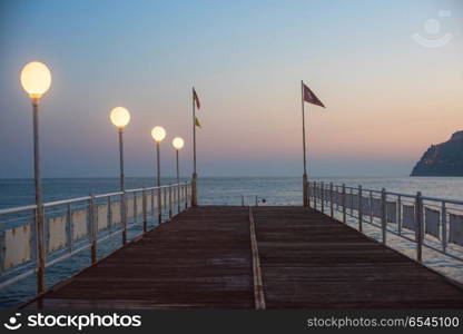 Alanya dock in the evening. Alanya city, view from the beach, one of the famous destinations in Turkey