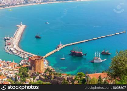 Alanya pier and the lighthouse, view from the castle, Turkey.. Alanya pier and the lighthouse, view from the castle, Turkey