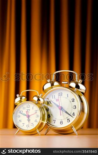 Alarm clock against curtain