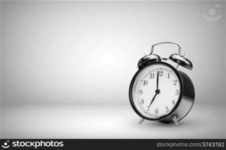 Alarm clock on gray background