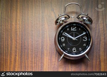 Alarm Clock On Wooden Background,