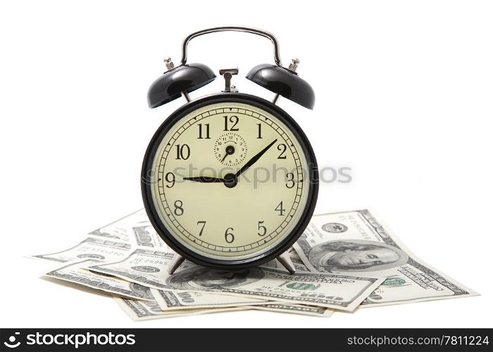 alarm clock over heap of money isolated