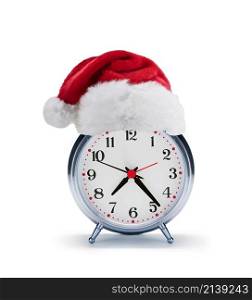 alarm clock with christmas santa hat isolated on a white background. alarm clock with christmas santa hat