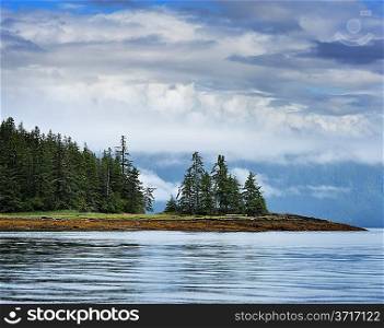 Alaska Landscape With A Blue Sky And Forest