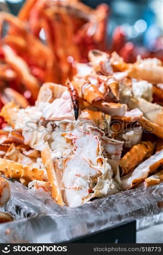 Alaskan King crab in seafood on ice buffet bar