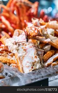 Alaskan King crab in seafood on ice buffet bar