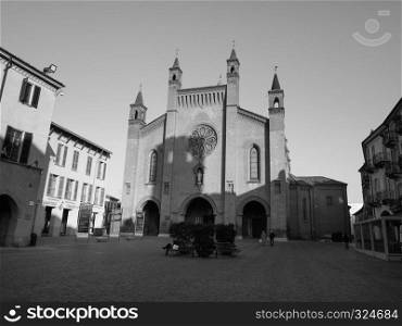 ALBA, ITALY - CIRCA FEBRUARY 2019: Duomo di San Lorenzo (St Lawrence cathedral) in black and white. San Lorenzo Cathedral in Alba in black and white