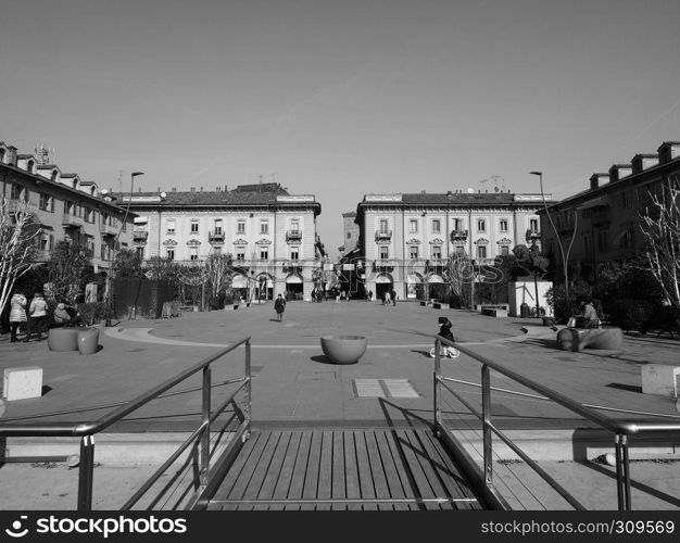 ALBA, ITALY - CIRCA FEBRUARY 2019: Piazza Michele Ferrero (previously known as Piazza Savona) square in black and white. Piazza Michele Ferrero square in Alba in black and white