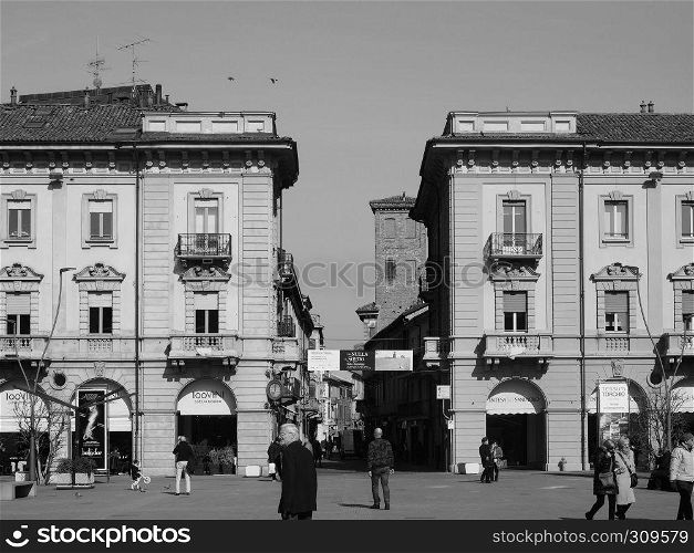 ALBA, ITALY - CIRCA FEBRUARY 2019: Piazza Michele Ferrero (previously known as Piazza Savona) square in black and white. Piazza Michele Ferrero square in Alba in black and white