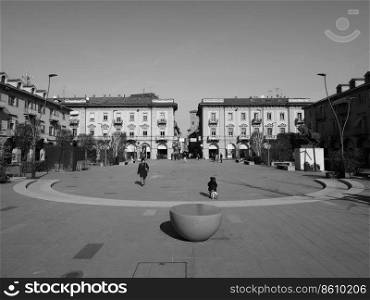 ALBA, ITALY - CIRCA FEBRUARY 2019  Piazza Michele Ferrero  previously known as Piazza Savona  square in black and white. Piazza Michele Ferrero square in Alba in black and white