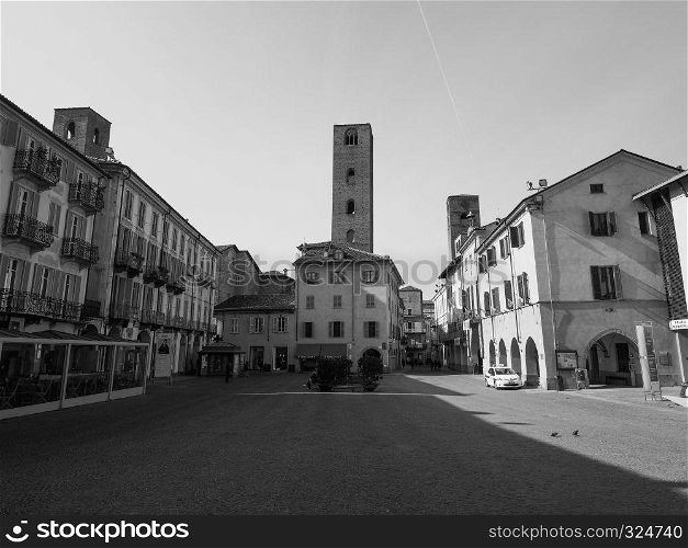 ALBA, ITALY - CIRCA FEBRUARY 2019: Piazza Risorgimento cathedral square in black and white. Piazza Risorgimento square in Alba in black and white