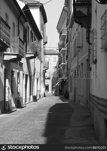 ALBA, ITALY - CIRCA FEBRUARY 2019: View of the city centre in black and white. View of the city of Alba in black and white