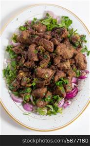 Albanian Liver, a traditional Turkish spiced lamb&rsquo;s liver recipe popular throughout the Middle East, high angle